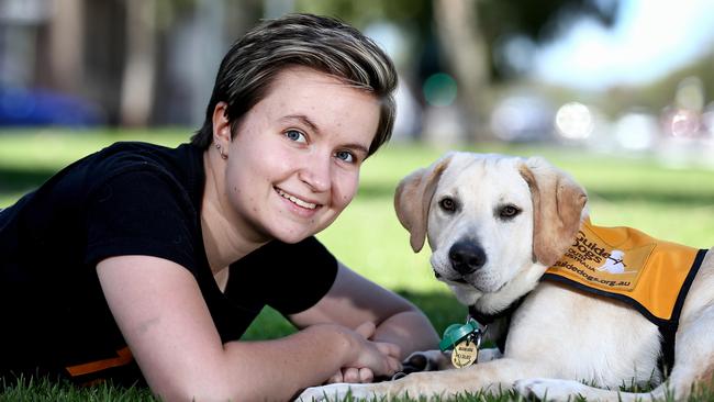 Guide dog trainer Rachel Thompson-Hoare with 4-month-old Guide Dog puppy Linc. Picture: Mike Burton