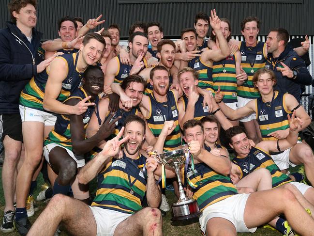 St Kevins celebrate last year’s premiership. Picture: Hamish Blair