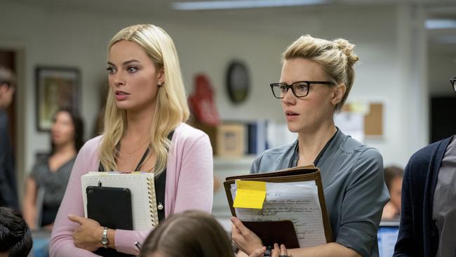 Margot Robbie, left, and Kate McKinnon in a scene from Bombshell.