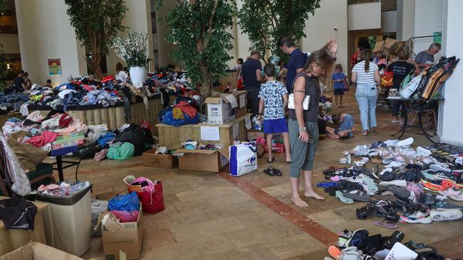 Israeli evacuees from kibbutzim near the Gaza border receive clothing donations at a hotel in the Dead Sea October 9, 2023. Picture: Gil Cohen-Magen/AFP