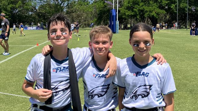 Howrah Primary School students Tex Daly, Cooper Wells and Macy Fitz at the 2024 U12 flag football national championships on the Gold Coast. Picture: Mitch Bourke.