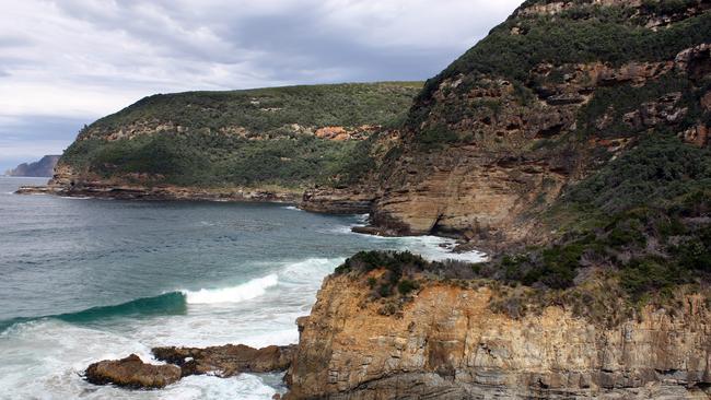 surf near Remarkable Cave, Tasman Peninsula. by Kane Young