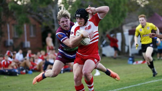 Corey Thomas makes a try saving tackle for Wavell SHS in 2020. (Image/Josh Woning)