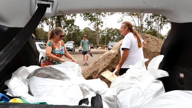 Kathy Birmingham and Denise Copp and collect bags for Denise’s shop at Shorncliffe. Picture: David Clark