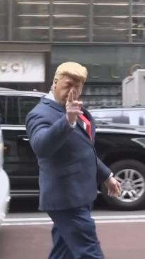 Man in Trump mask 'directs' New York traffic outside Trump Tower