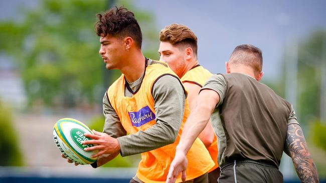 Jordan Petaia passes the ball during a Wallabies training session. Picture: Patrick HAMILTON / AFP