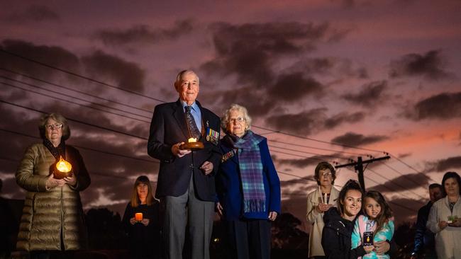 WWII veteran Wally McGillivray stands with his family and neighbours. Picture: Jason Edwards