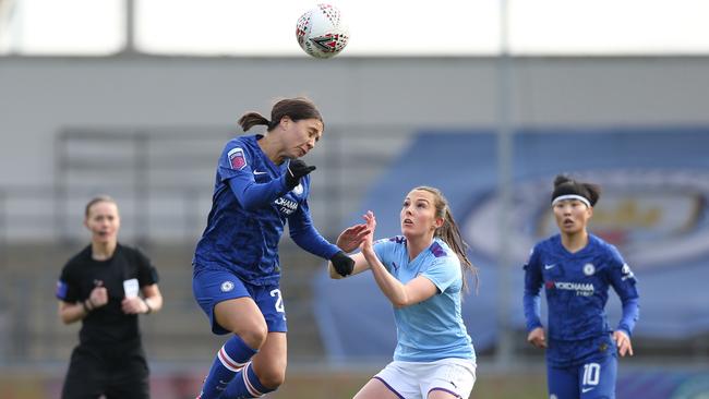 Chelsea’s Sam Kerr, left, heads the ball against Manchester City