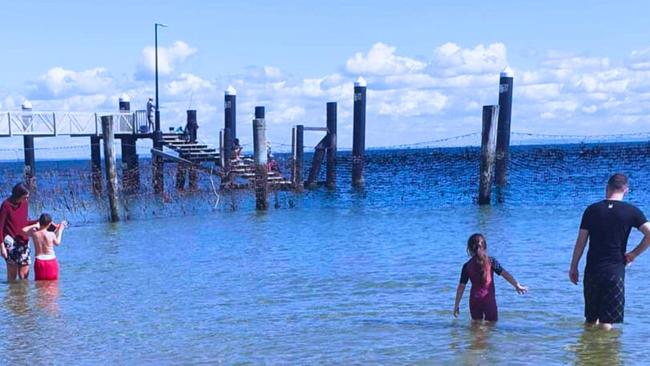 Jai Warner and his family at one of the Straddie swimming enclosures. Pictures: Contributed