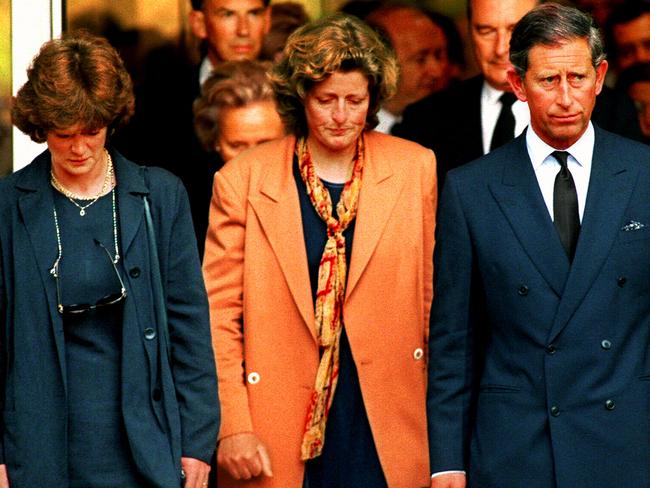 Prince Charles (r) leaving the hospital in Paris where Diana died with the Princess's sisters Lady Jane Fellowes (l) and Lady Sarah McCorquodale.