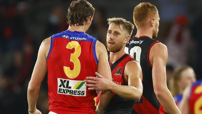 Dyson Heppell greets Joe Daniher after their encounter. Picture: Getty Images