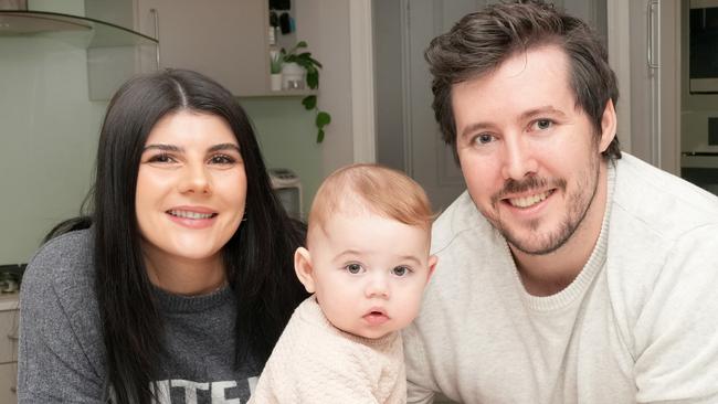 Adelaide tops the nation for 20-year home price growth. Kevin and Tayla Coates and their son, 9 month old Kieran, outside their home at Greenwith. 24 May 2025. Picture: Dean Martin