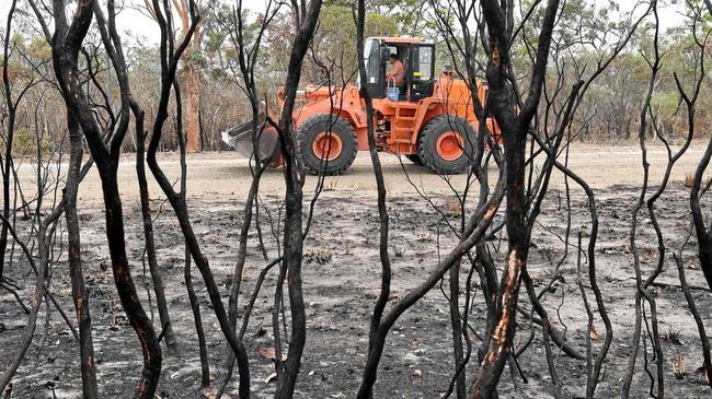 Earthmoving equipment in Deepwater after the fires swept through the region. Picture: Mike Knott BUN051218DEE1