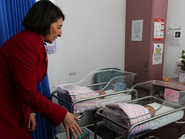 SYDNEY, AUSTRALIA - NewsWire Photos MAY 18, 2021: Premier Gladys Berejiklian meets Mother Tenaj Mitchell who had twins Taevius and J'Myrah Mitchell born yesterday during a visit to Liverpool Hospitalâs maternity ward to meet new parents and mark a major milestone for the Baby Bundle in Sydney, Australia. Picture: NCA NewsWire / Gaye Gerard