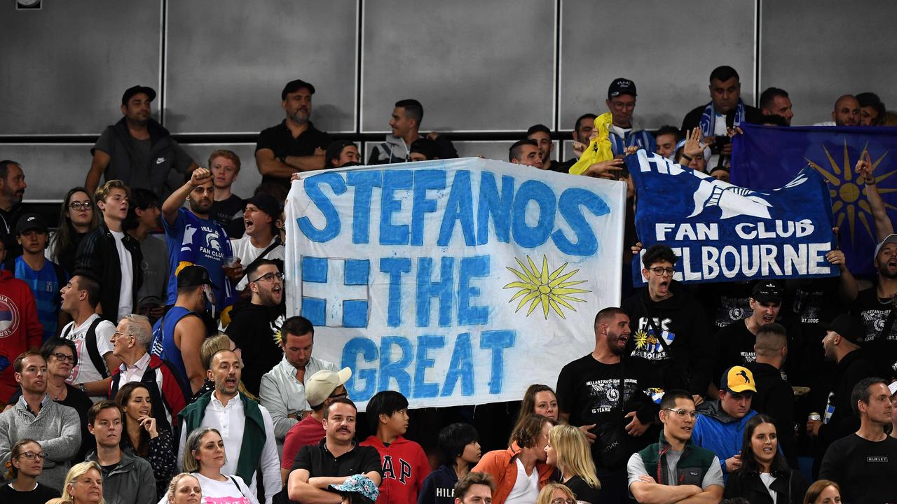 Supporters of Greece's Stefanos Tsitsipas shout for him during his men's singles match against Italy's Salvatore Caruso.