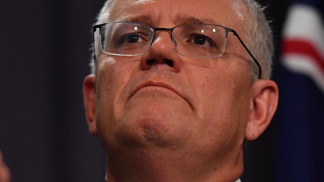 CANBERRA, AUSTRALIA - MARCH 23: Prime Minister Scott Morrison during a press conference at Parliament House on March 23, 2021 in Canberra, Australia. The federal government was yesterday set back by new allegationsÃÂ broadcastÃÂ by the Ten Network after pixelated images of unnamed Coalition advisers allegedly engaging in performing lewd sex acts on the desks of female MPs resulting in a Morrison staff member being sacked last night. Additionally, the ABC Network aired a first hand account by an Australian Parliament security guard of what she witnessed on the night Brittany Higgins was allegedly raped in the office of then-defence industry minister Linda Reynolds in early 2019. (Photo by Sam Mooy/Getty Images)