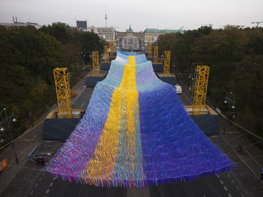 The enormous 'Visions In Motion' near the Brandenburg Gate contains 30,000 messages from Berliners and their hopes for the future. Picture: AP Photo/Markus Schreiber.