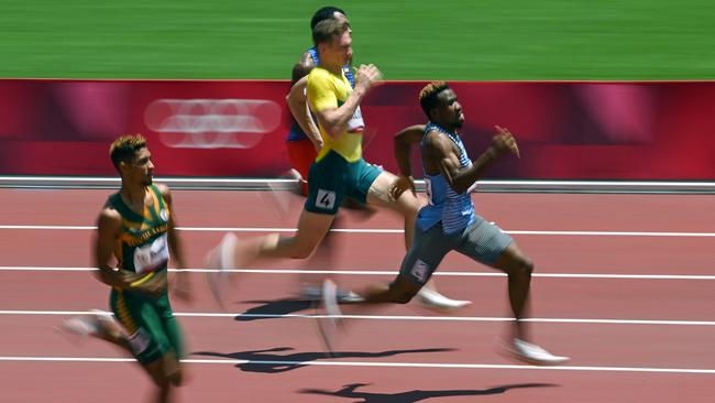 Solomon on his way to second and a personal best. Picture: InaFassbender/AFP