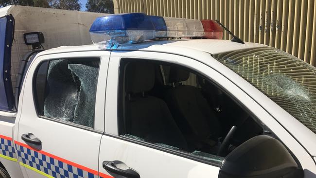 NT Police officers had rocks thrown at them at a town camp near Alice Springs.