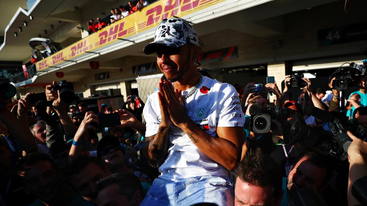 Lewis Hamilton celebrates his sixth world title. Picture: Dan Istitene