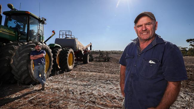 ‘Have we ever dumped barley? I don’t think so’: Barry Clarke and son Jarrod on their farm at Bolgart, WA, on Tuesday. Picture: Colin Murty