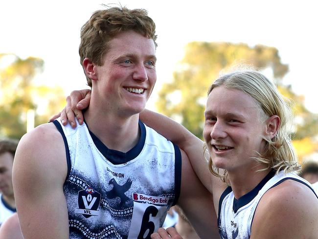 Toby Conway and Ollie Dempsey have a laugh. Picture: Kelly Defina/AFL Photos/via Getty Images