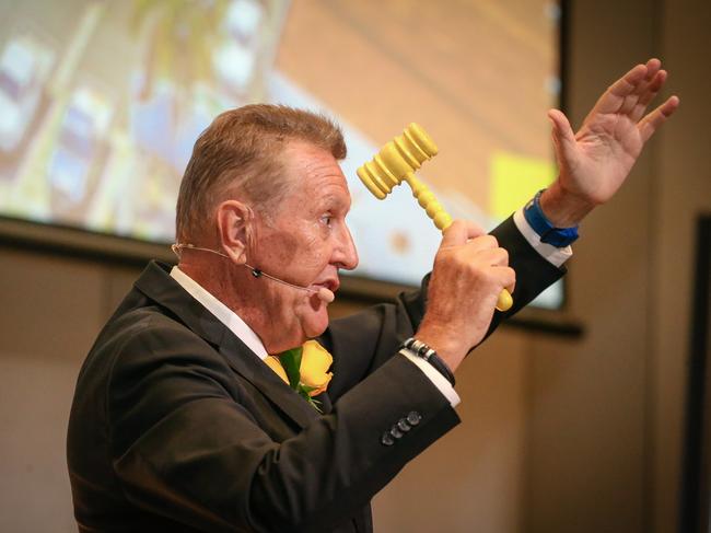 Head Auctioneer Andrew Bell as Ray White Surfers Paradise Group holds its annual  mega auciton event with up to 3000 hopefuls attend over the day.Picture: Glenn Campbell