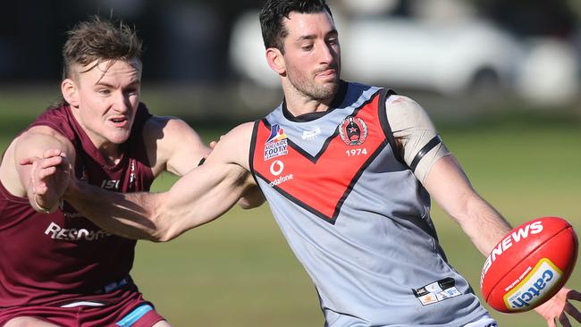 Luke Manuel gets a kick away under pressure earlier this month. Picture: Dean Martin