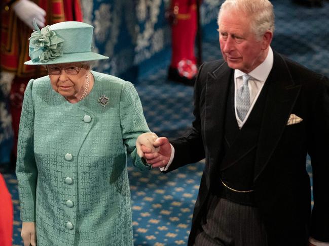 Britain's Queen Elizabeth II is accompanied by her son Britain's Prince Charles. Picture: AFP