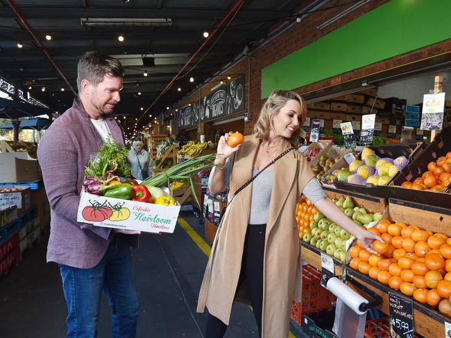 MELBOURNE, AUSTRALIA - JUNE 17TH, 2022 : Kayla and Rowan Teasdale shopping for fruit and veggies at the South Melbourne Market.Picture : Nicki Connolly