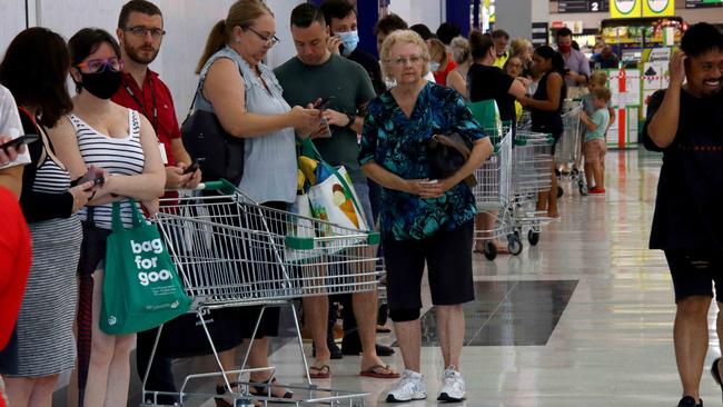 Supermarkets across Brisbane have been flooded with shoppers after a three-day lockdown was announced. Picture: David Clark