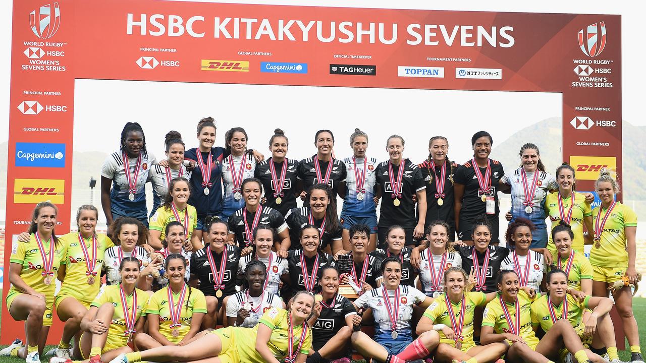 Cup final winners New Zealand pose with silver medallist France and bronze medallist Australia on day two of the HSBC Women's Rugby Sevens Kitakyushu.