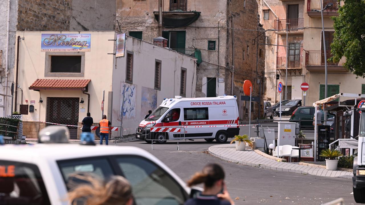 An ambulance near the harbour where a search for missing passengers continues. Picture: Vincenzo Pepe/Getty Images