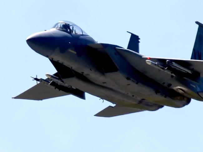 (FILES) In this file photo taken on July 12, 2005, A US Air Force F-15 fighter jet, takes off from Lakenheath Air Base. - A US fighter jet on a training mission from a British Royal Air Force base in eastern England crashed in the North Sea on June 15, 2020, the US Air Force said. "A US Air Force F-15C Eagle crashed at approximately 0940 (0830 GMT) today (Monday) in the North Sea," USAF Captain Miranda T Simmons said. The cause of the crash is unknown and the fate of the pilot are not immediately known, she added. (Photo by MAX NASH / AFP)