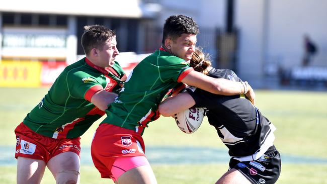 Wynnum players tackle hard. . Picture, John Gass