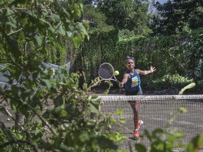 Ex Cairns to The Australian,   22.04.2020Covid-19 -  Cairns  -  Tennis in the Bush É PICS by BRIAN CASSEYCairns tennis coach Guy Thomas  is not letting the coronavirus interupt the training of his young tennis stars. Banned from his usual curts Guy found a remote ÔforgottenÕ tennis court amongst the far north Queensland jungle that hadnÕt been used for 28 years  where he trains his young students É in this case young star Giselle Kawane.  Students may have to contend with snakes on the court and crocodiles lurk just through the bush. Giselle has been selected for the prestigious Queensland Judy Dalton team , has represented her state twice and has has been selected for National Evonne Goolagong camps.   Pic - Brian Cassey