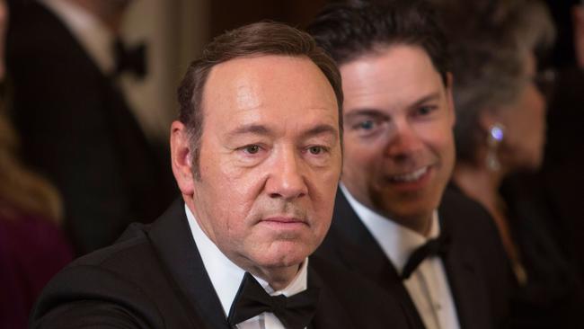 (FILES) In this file photo taken on December 4, 2016, actor Kevin Spacey acknowledges another guest during a reception for the 2016 Kennedy Center Honorees at the White House in Washington, DC. - Prosecutors dropped sexual assault proceedings against Spacey on July 17, 2019, after the case against the Hollywood star collapsed over his alleged victim's refusal to testify. William Little had accused the 59-year-old actor of groping him in a bar on the resort island of Nantucket in July 2016. But Massachusetts prosecutors filed a formal notice of abandonment of indecent assault and battery charges due to "the unavailability of the complaining witness," who had declined to give evidence due to fear of self-incrimination. (Photo by CHRIS KLEPONIS / AFP)