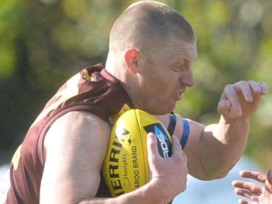 Eastern Football Leaguie Division 3 football: Boronia v Waverley Blues at Tormore reserve, Boronia. Boronia #52 Ben Robertson tries to burst through. Picture:AAP/ Chris Eastman