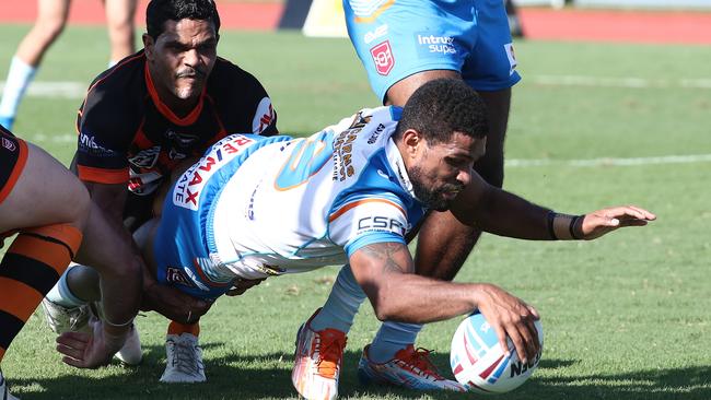 Pride captain Jayden Hodges dives over the line to score a try. Picture: Brendan Radke