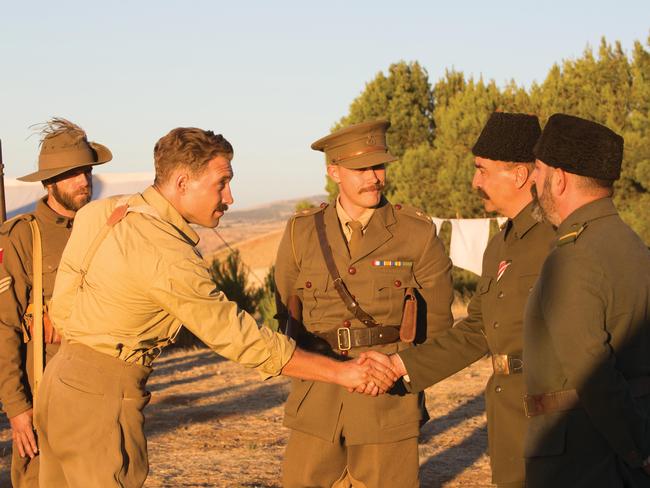 Warm and human ... Yilmaz Erdogan (second from right) with Jai Courtney (second from left) and Michael Dorman (centre) in The Water Diviner put in a faultless performance. Picture: Supplied.