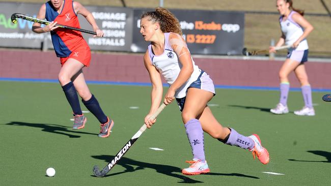 Commercial player Casey Dolkens takes control on the ball in the Div 1 play-off final. Picture, John Gass.