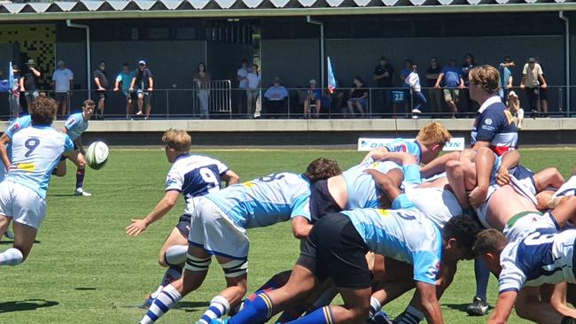 Action in the match between the Gen Blues Junior and a Schools Selection side.