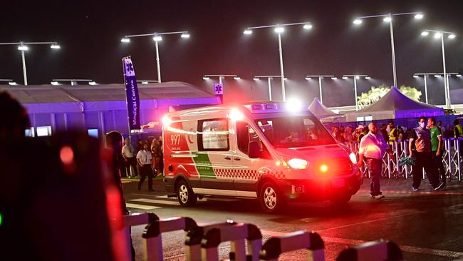 An ambulance transports Haas' German driver Mick Schumacher to a helipad to be taken to hospital following a crash
