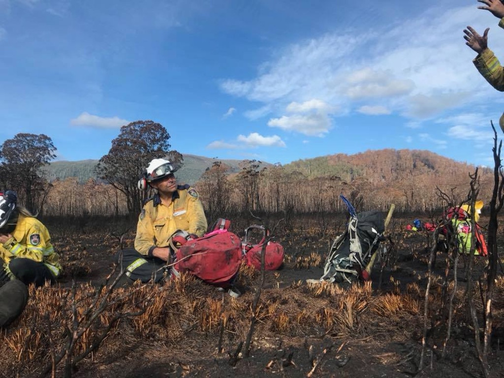 Rural Fire Service NSW members helping to battle the Gell River fire in the Tasmanian South West. Picture: NSW RFS