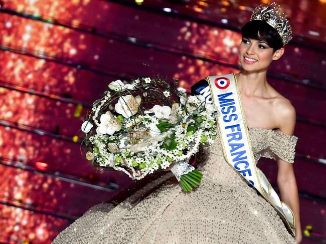 Eve Gilles is crowned Miss France 2024, despite controversy over her short haircut. Picture: Arnaud Finistre/AFP