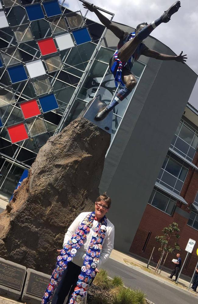 The statue of Ted Whitten is a fixture at Whitten Oval — and so is Irene Chatfield.