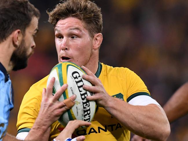 Michael Hooper of the Wallabies (centre) is seen during the Rugby Championship match between Australia and Argentina at Suncorp Stadium in Brisbane, Saturday, July 27, 2019. (AAP Image/Dan Peled) NO ARCHIVING, EDITORIAL USE ONLY