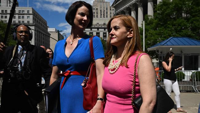 Sarah Ransome (L) and Elizabeth Stein (R), alleged sexual abuse victims of Jeffrey Epstein, leave the US District Court. Picture: Ed Jones/AFP