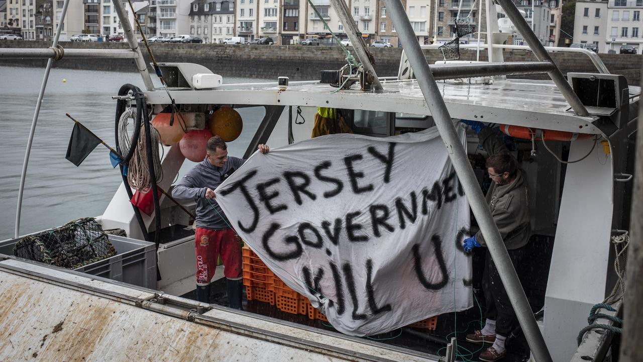 French fishermen protest with a banner that reads: “Jersey government kill us.” Picture: Getty Images