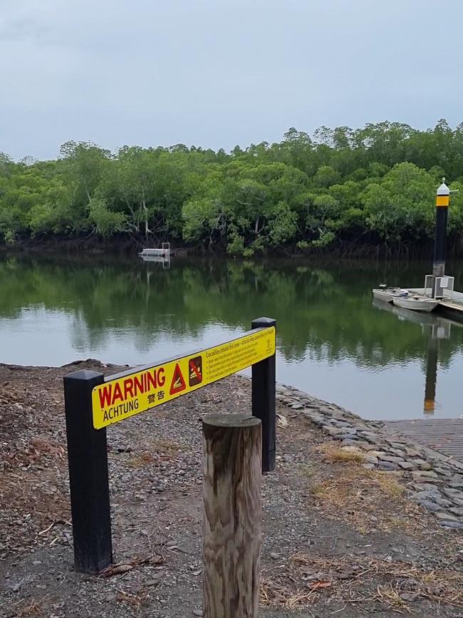 Warning signs at the Redbank boat ramp near Cairns. PHOTO: Queensland Government, Department of Environment and Science.